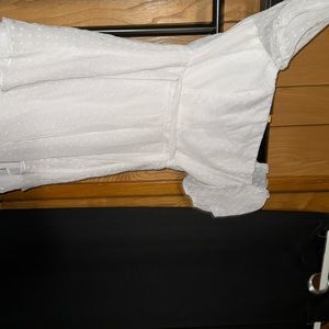 B. smart, size 13 dress that ties in the back color  white